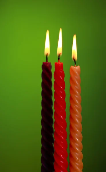 Three Candles On Green — Stock Photo, Image