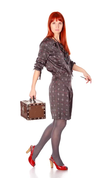Extravagante vrouw met koffer — Stockfoto
