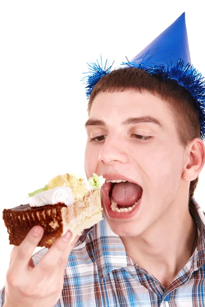 Лицо человека поедающего торт . — стоковое фото