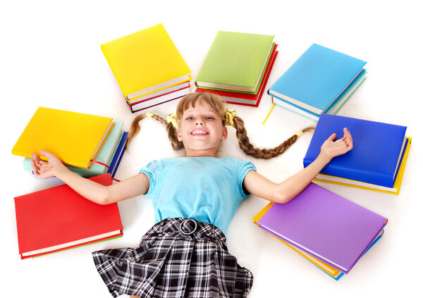 Child with open book lying on floor.