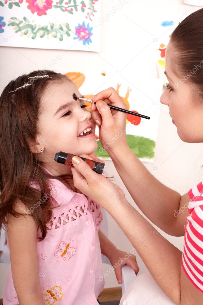 Child preschooler with face painting.