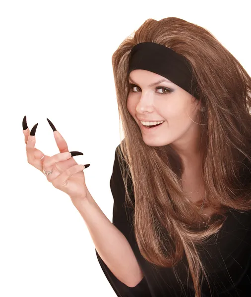 Μάγισσα σε μαύρο κοστούμι και μακριά μαλλιά με νύχι δάκτυλο. — Φωτογραφία Αρχείου