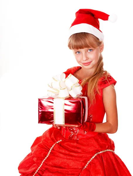 Barn i santa hatt hålla röd presentask. — Stockfoto