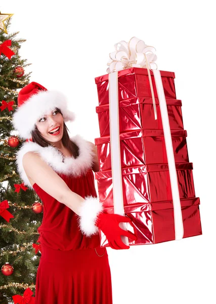 Menina de Natal em santa chapéu e abeto com caixa de presente vermelho . — Fotografia de Stock