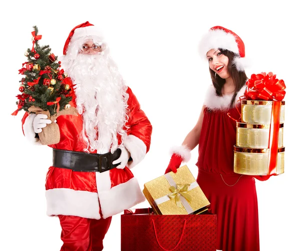 Santa Claus with Christmas girl holding gifts. — Stock Photo, Image