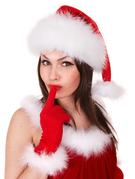 Weihnachtsmädchen mit Weihnachtsmütze macht Schweigegegeste. — Stockfoto