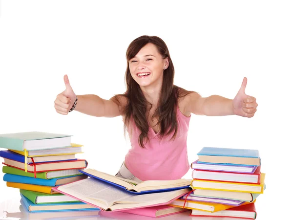 Menina com pilha livro mostrando polegar para cima . — Fotografia de Stock
