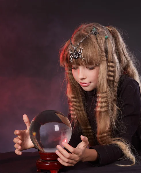 Child holding crystal ball. — Stock Photo, Image