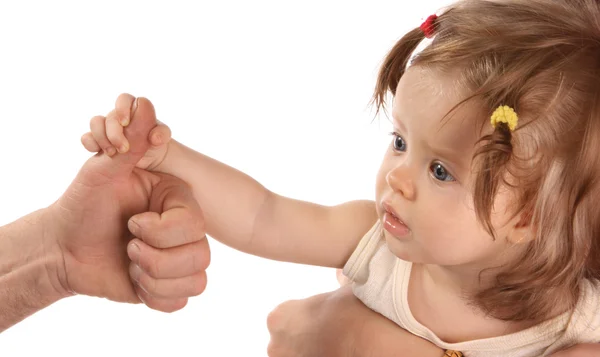 Çocuk holding yetişkin parmak. izole. — Stok fotoğraf