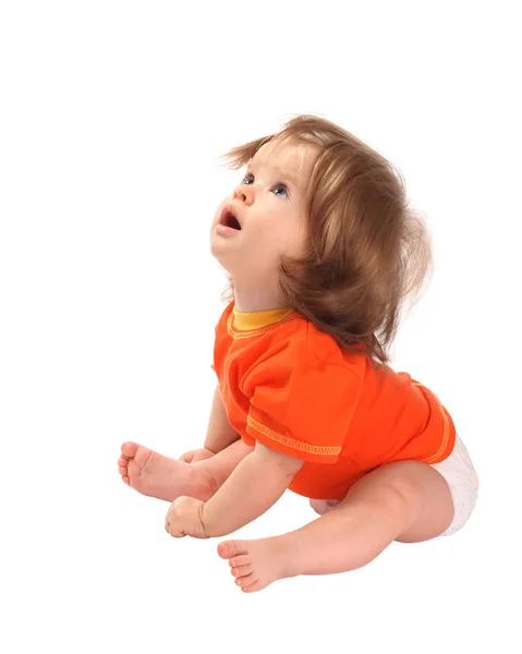 Meisje van de baby in oranje t-shirt. geïsoleerd. — Stockfoto