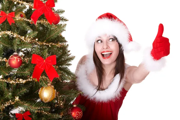 Christmas girl and fir tree with thumb up. Royalty Free Stock Photos