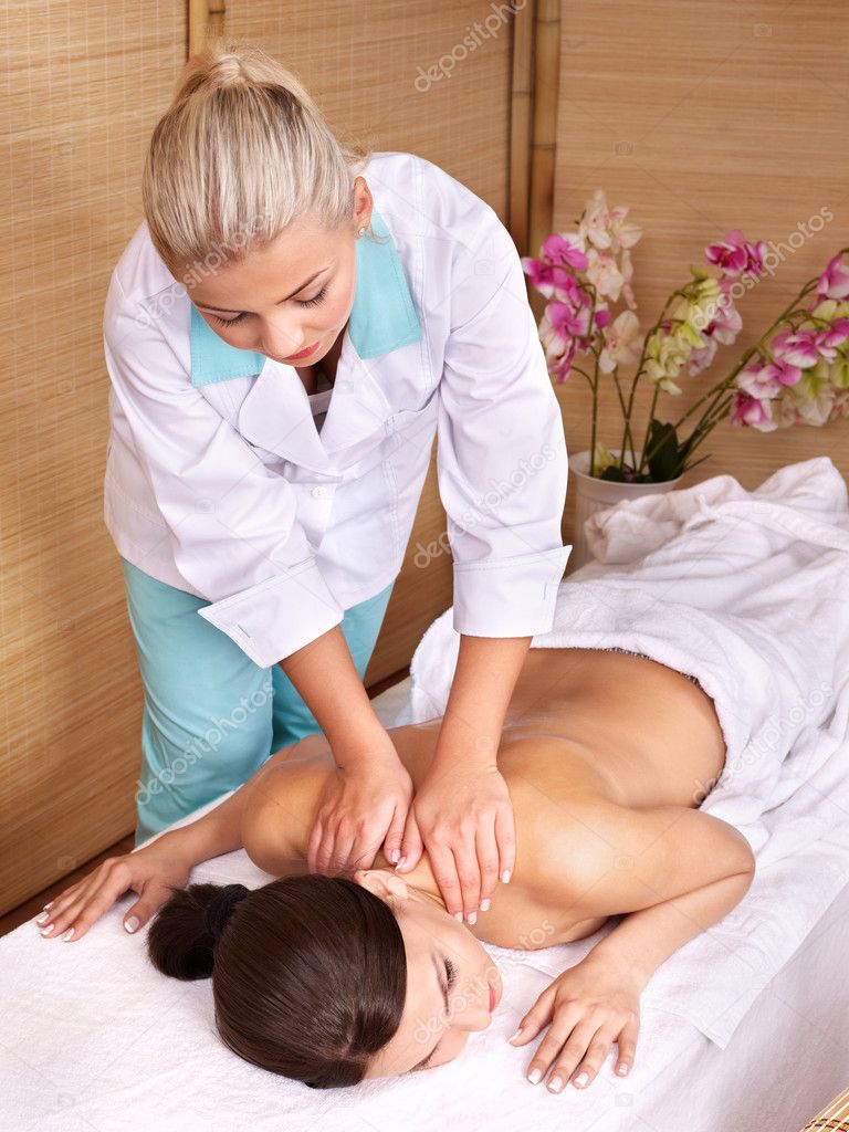 DepositphotosYoung woman on massage table in beauty