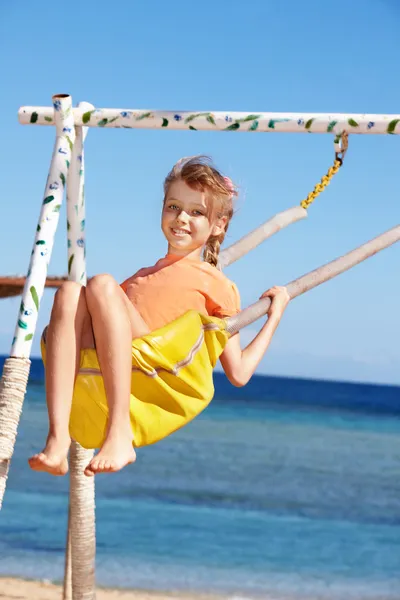 Happy little girl on swing. — Stock Photo, Image