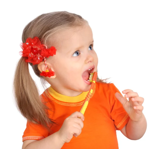 Gyermek tiszta ecsettel egy fogak. — Stock Fotó