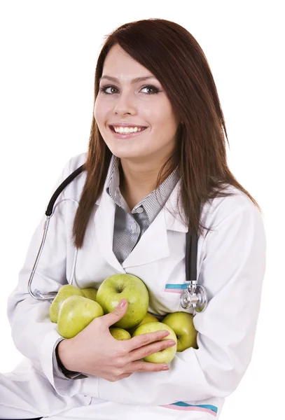 Médico com estetoscópio e maçãs verdes de grupo . — Fotografia de Stock