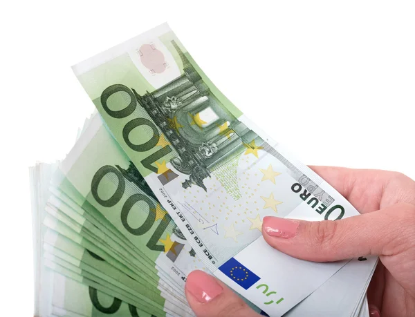 Деньги евро в женской руке . — стоковое фото