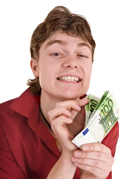 Gelukkig man in het rood met geld. — Stockfoto