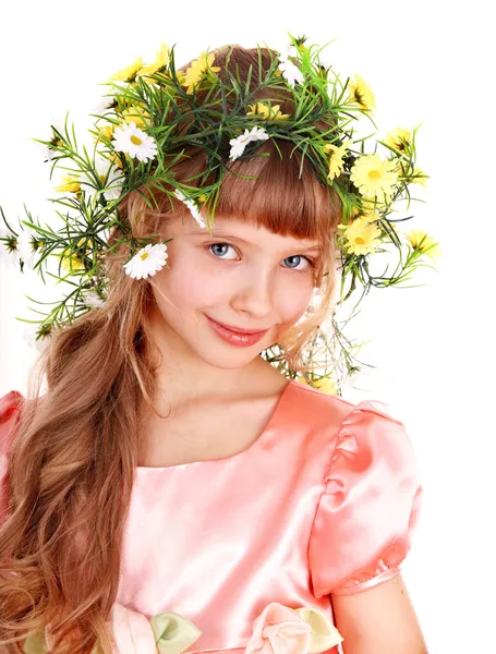 Mooi meisje met garland van voorjaar bloem. — Stockfoto