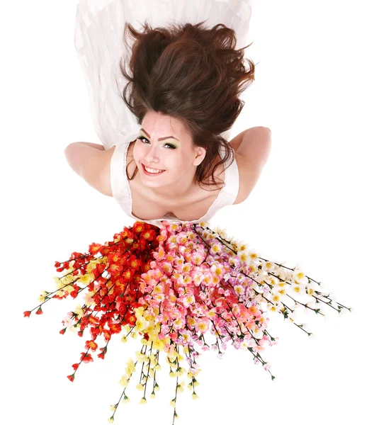 Junge Frau mit Frühlingsblume. — Stockfoto