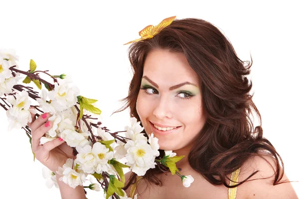 Beautiful smiling girl with spring flower. — Stockfoto