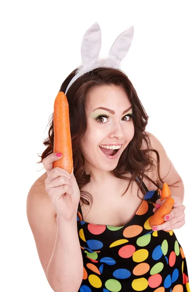 Face of girl eating carrot. — Stockfoto
