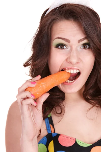 Face of girl eating carrot. — Stok fotoğraf