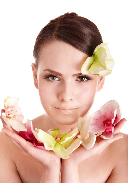 Beautiful girl with flower in spa. — Stock Photo, Image