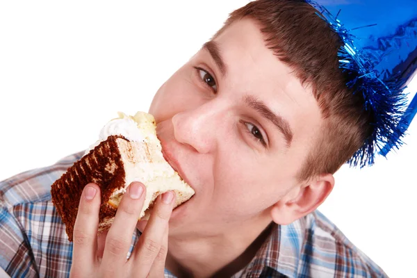 年轻男子吃巧克力蛋糕. — 图库照片