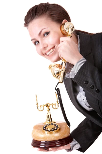 Gelukkig zakenvrouw met gouden telefoon. — Stockfoto