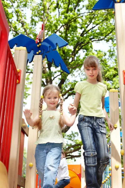 Children on slide outdoor in park. — Stock Photo, Image