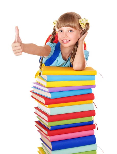 Schoolgirl with pile of books and showing thumb up. — Stock Photo, Image