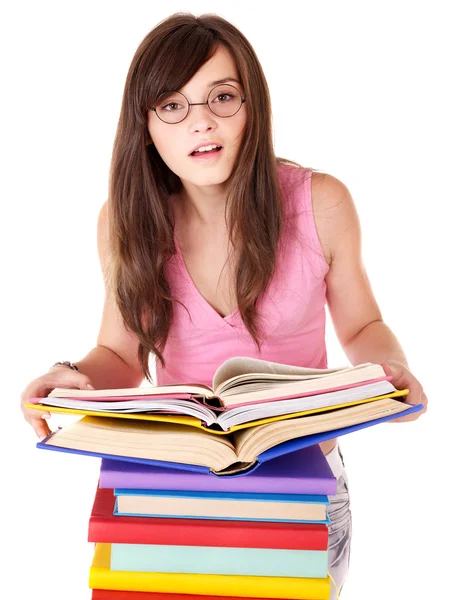 着色された本の杭を持つ少女 . — ストック写真