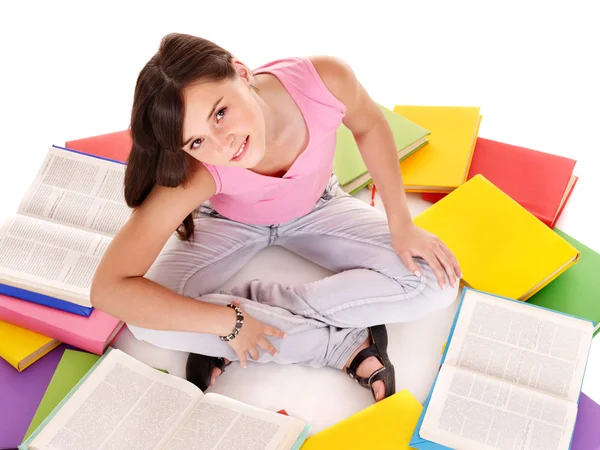 Dziewczyna książką kolorowych kupie. — Zdjęcie stockowe
