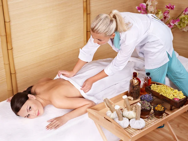 Young woman on massage table in beauty spa. Series. — Stock Photo, Image