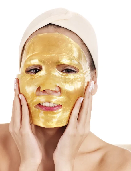 Дівчина з золотою маскою для обличчя . — стокове фото