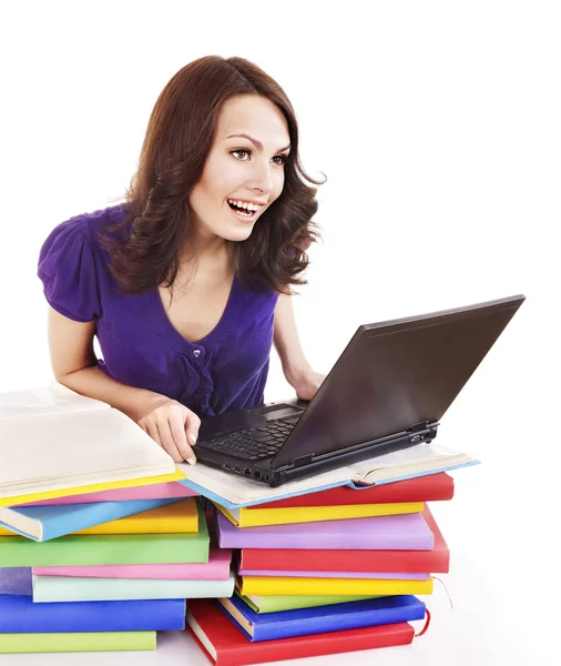 Yığın renkli kitap ve laptop ile kız. — Stok fotoğraf