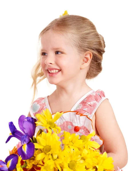 Lyckligt barn anläggning blommor. — Stockfoto