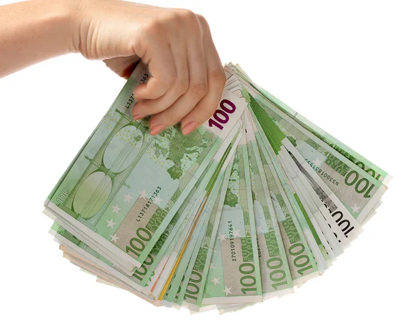 Деньги евро в женской руке . — стоковое фото