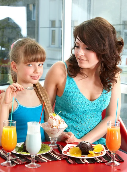 Mother and daughter in restaurant. Royalty Free Stock Photos