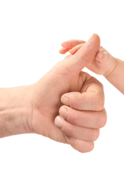 Рука ребенка держит старика за руку . Стоковая Картинка