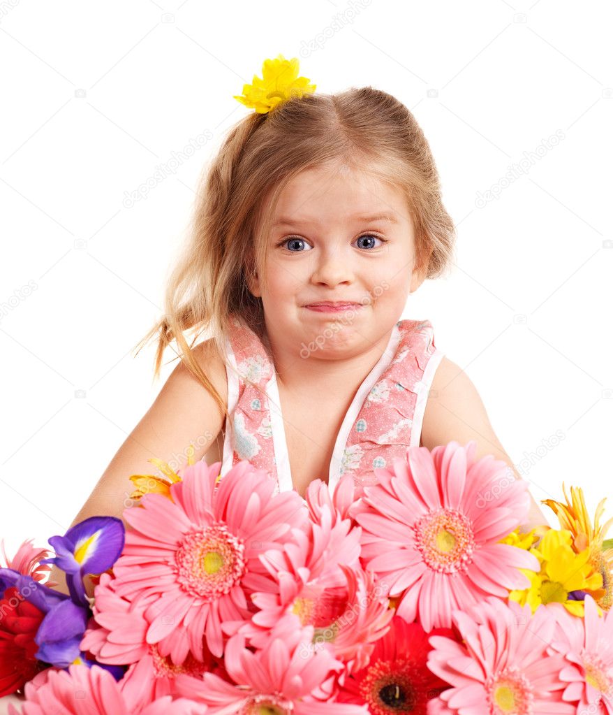 Surprised child holding flowers.