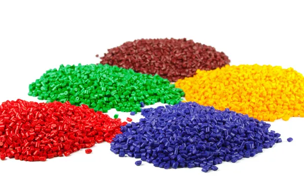 Färgglada plast granulat — Stockfoto