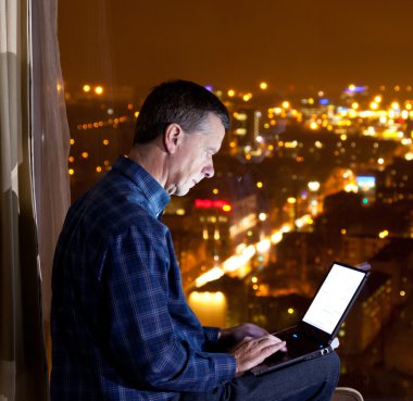 Man looking over city clipart