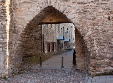 Arch in castle walls of Tallinn clipart