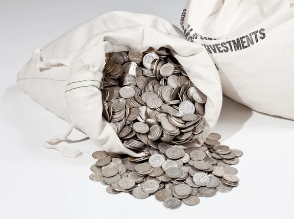 Bag of silver coins Stock Photo