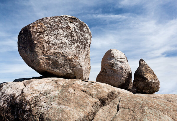 Three balanced boulders