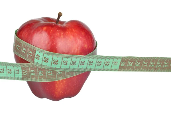 赤いリンゴ メーターを測定 — ストック写真