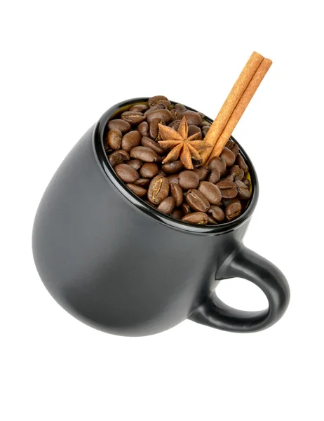Coffee beans and spices in a mug — Stock Photo, Image