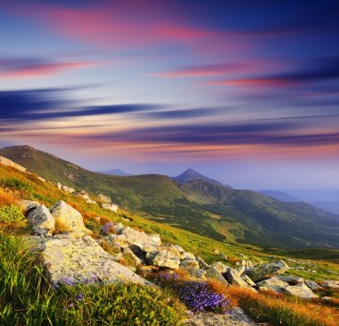 Majestic sunset in the mountains landscape. HDR image clipart