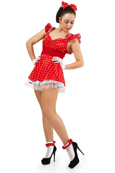 穿红裙子的年轻女子姿势. — 图库照片